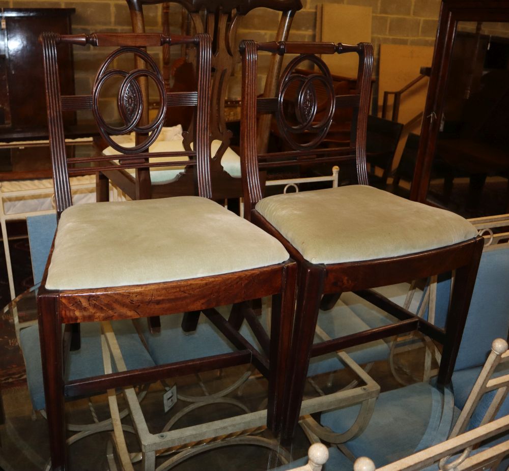 A pair of George III dining chairs and four Chippendale revival mahogany dining chairs